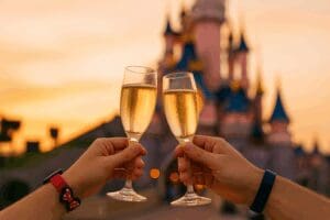 Couple Toasting Champagne at Disneyland Paris Castle – Romantic Moment