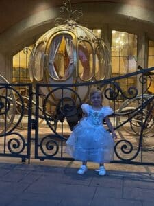 outside auberge de cendrillon with cinderellas carriage